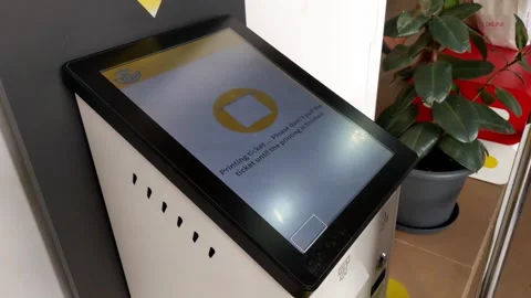 Lloret de Mar, Spain, October 3, 2024: Interactive Kiosk Touchscreen Stock Footage 297692253