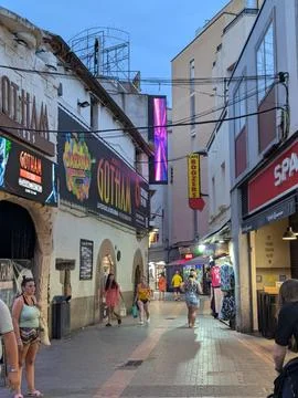 Lloret de Mar, Spain - September 09, 2024 Busy market street with colorful Stock Photos