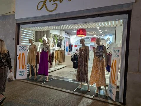 Lloret de Mar, Spain - September 09, 2024 Storefront Fashion Window Stock Photos
