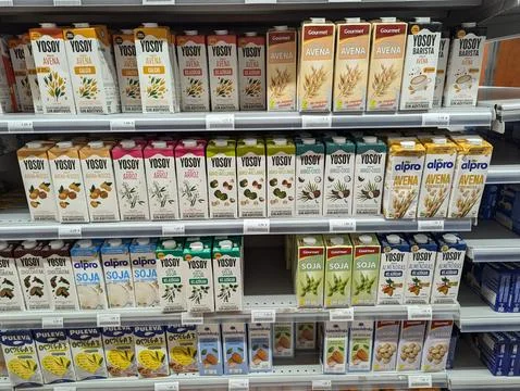 Lloret de Mar, Spain - September 09, 2024 Assorted plant based milks upermark Stock Photos