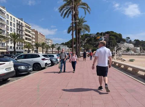 Lloret de Mar, Spain - September 09, 2024 Sunlit coastal promenade in Lloret Stock Photos