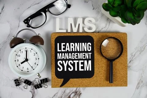 LMS - Learning Management System acronym with alarm clock and magnifying gl.. Stock Photos