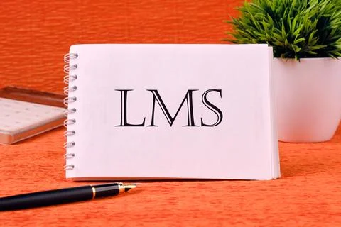 LMS stands for Learning Management System. LMS word on a white notebook on .. Stock Photos