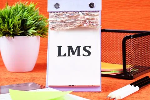 LMS stands for Learning Management System. LMS word on a loose leaf of a desk Stock Photos