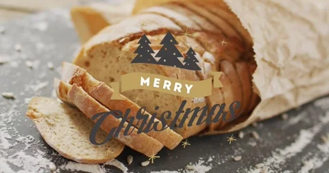 On load animating emblem above rustic loaf, ribbon appearing, cursive Christmas Stock Footage 327125027