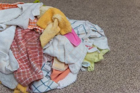 A Load of Clean Hand Towels Ready to Be Folded on the Floor Stock Photos