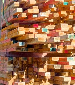 Load of colourful construction timber Foto stock