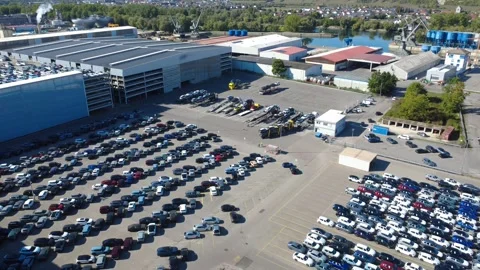 Loaded Car Transporter Driving Through Large Automotive Terminal Stock Footage 346599084
