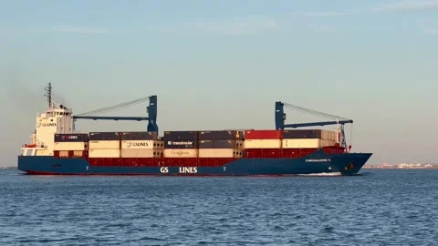 Loaded Cargo Container Commercial Ship Navigating Tagus River, Sunset, Lisbon Stock Footage 245700707