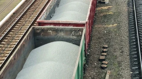 Loaded cargo train moves on railway Stock Footage 74153284
