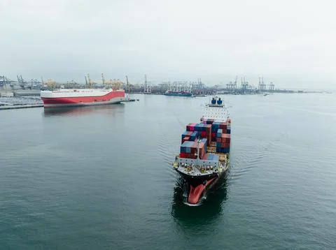 Loaded Container Ship Sailing Through Shipping Lane In Laem Chabang Thailan.. Stock Photos