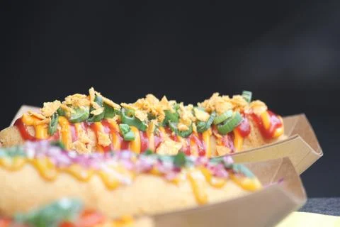 Loaded Corn Dogs with Crispy Toppings and Sauce Stock Photos