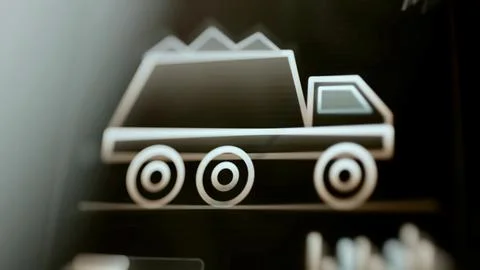 Loaded dump truck centered on mining control Stock Photos