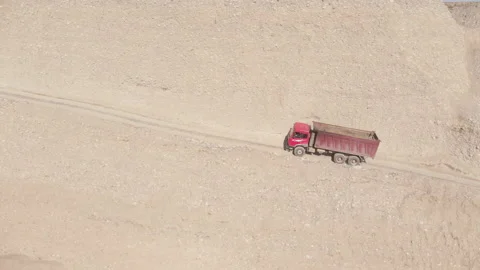 Loaded dump truck in a stone quarry Stock Footage 164472147