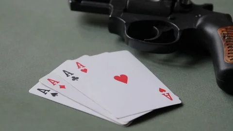 Loaded revolver-weighty argument when winning at cards Stock Footage 72199533