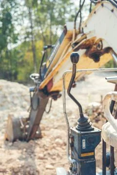 Loader backhoe Work of excavating machine on building construction site Stock Photos