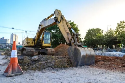 Loader bucket working at construction site. Stock Photos