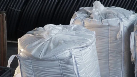 Loader carries polymer chips in stock Stock Footage 70012685