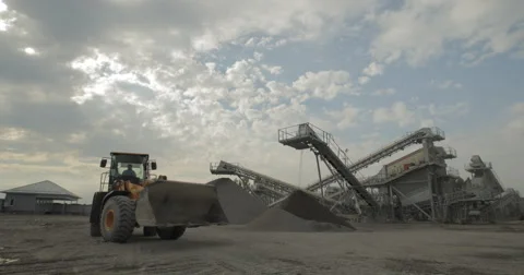 Loader Drive By Crushing And Sorting Facility (4K) Stock Footage 61328646