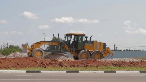 Loader excavator at road construction work Stock-Footage 83633565