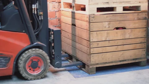 Loader loading large boxes with apples Stock Footage 106982731