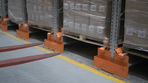 Loader loads boxes. Boxes in stock. Warehouse store Stock Footage 112399287