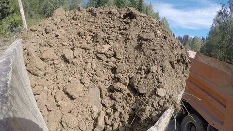 Loader loads dump truck Stock Footage 96579241