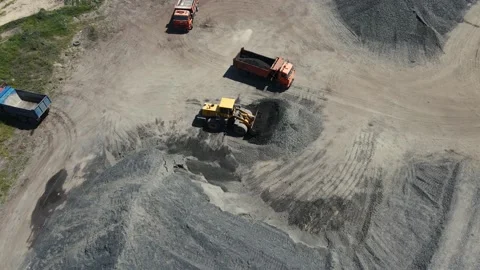 Loader loads a dump truck with rubble. 4k drone footage Stock Footage 160989211