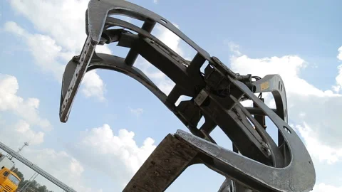 Loader of logs. Rotation of claws. Stock Footage 90009379