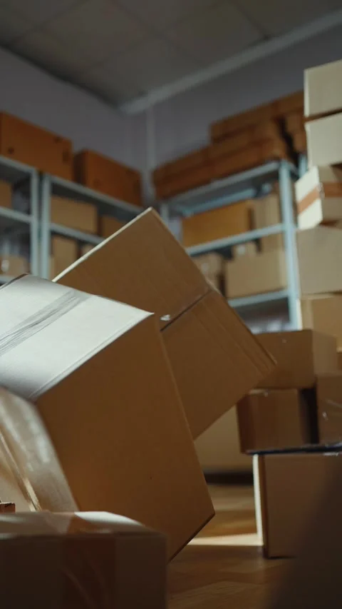 Loader is a man in a warehouse falling accident vertical video Stock Footage 275242025