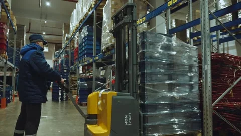 Loader operation in a warehouse, warehouse, storage room Stock Footage 327621527