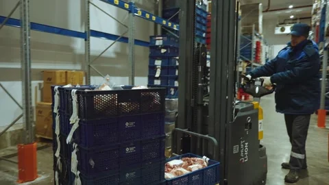 Loader operation in a warehouse, warehouse, storage room Stock Footage 327621535