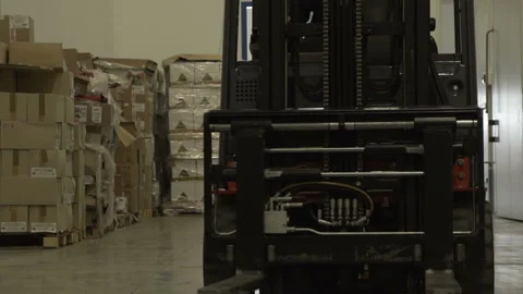 Loader with pallets loaded with boxes.  Stock Footage 167855791