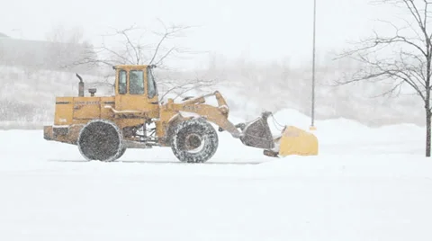 Loader Plowing Parkinglot Video stock 35730740