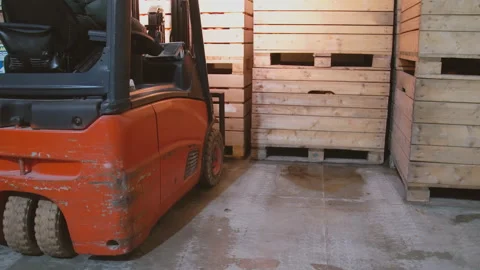 Loader rearranges boxes with apples Stock Footage 117664396