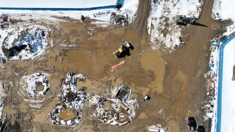 Loader Removing Snow At The Construction Site With Tire Tracks Visible Across Stock Footage 331556936