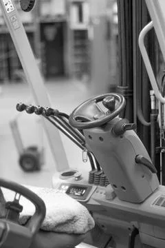 Loader steering with control levers.black and white Stock Photos