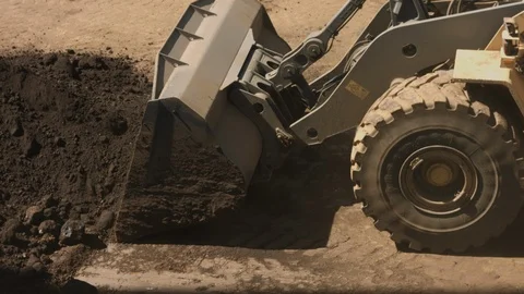 Loader transship clay in dock Stock Footage 90945964