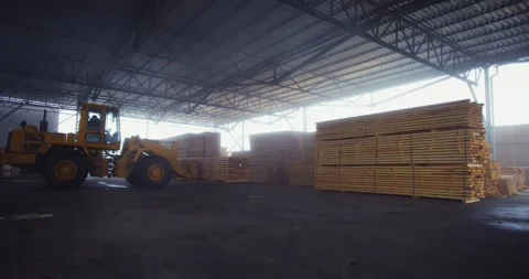 Loader in the warehouse of finished products, is engaged in the loading of Video stock 171636794