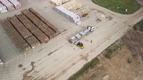 A loader works in the finished goods warehouse Stock Footage 219017665