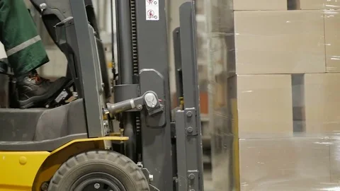 The loader works in the warehouse Stock Footage 76315613