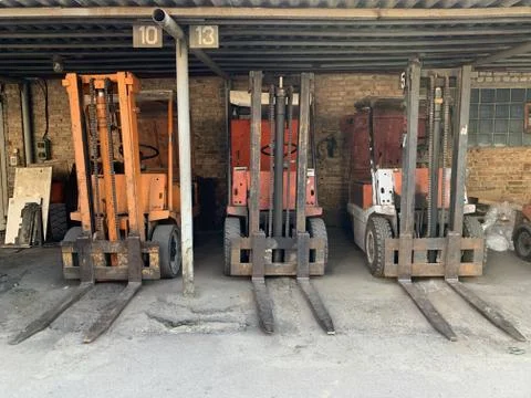 Loaders under a canopy. Electric machine for moving goods. Special equipment  Stock Photos