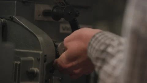 Loading a 35mm film projector Stock Footage 285549974