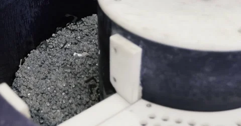 The loading of abrasive material in the grinding installation Stock Footage 77520159