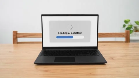 Loading AI assistant on your laptop to help you on your work. Concept of Stock Footage 310296062