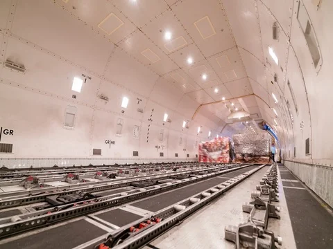 Loading air cargo freighter inside aircraft Видео 76239869