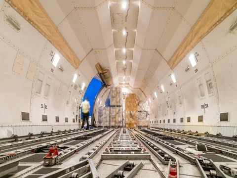 Loading air cargo freighter inside aircraft Видео 76239911