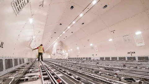 Loading air cargo freighter inside aircraft Video stock 79603210