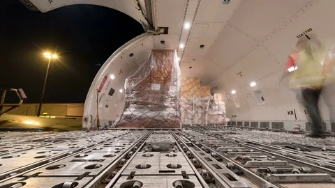 Loading air cargo freighter inside aircraft Video stock 79603291