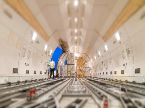 Loading air cargo freighter inside aircraft Stock Footage 80609500